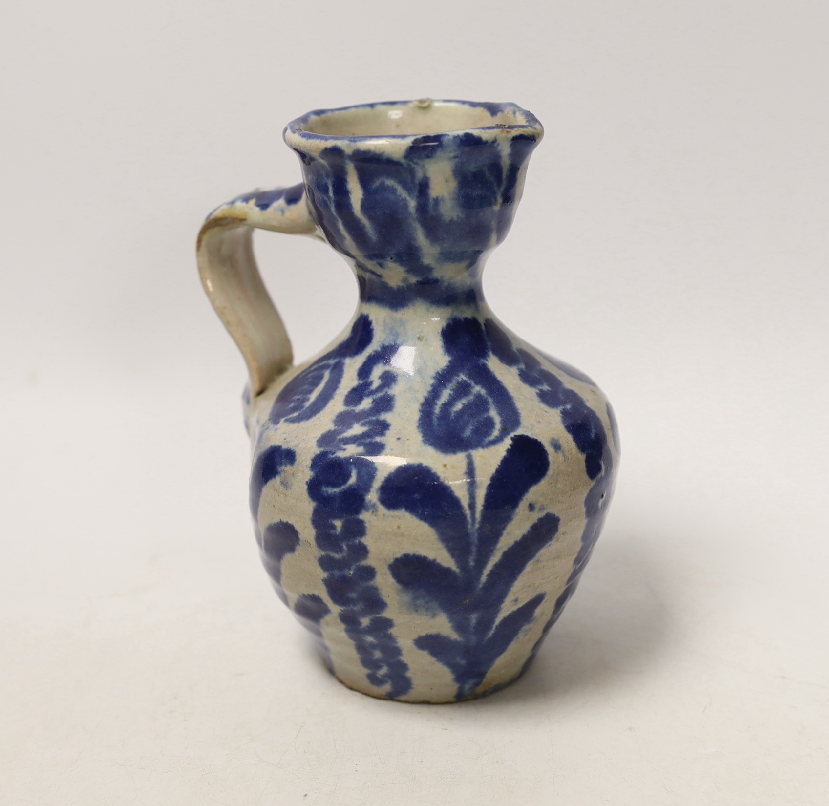 An 18th century Spanish maiolica jug, Grenada, 17cm